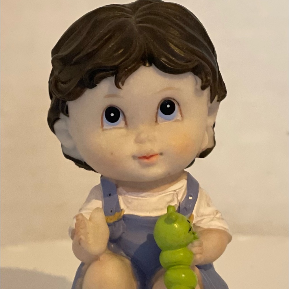 Tender Times boy with caterpillar
